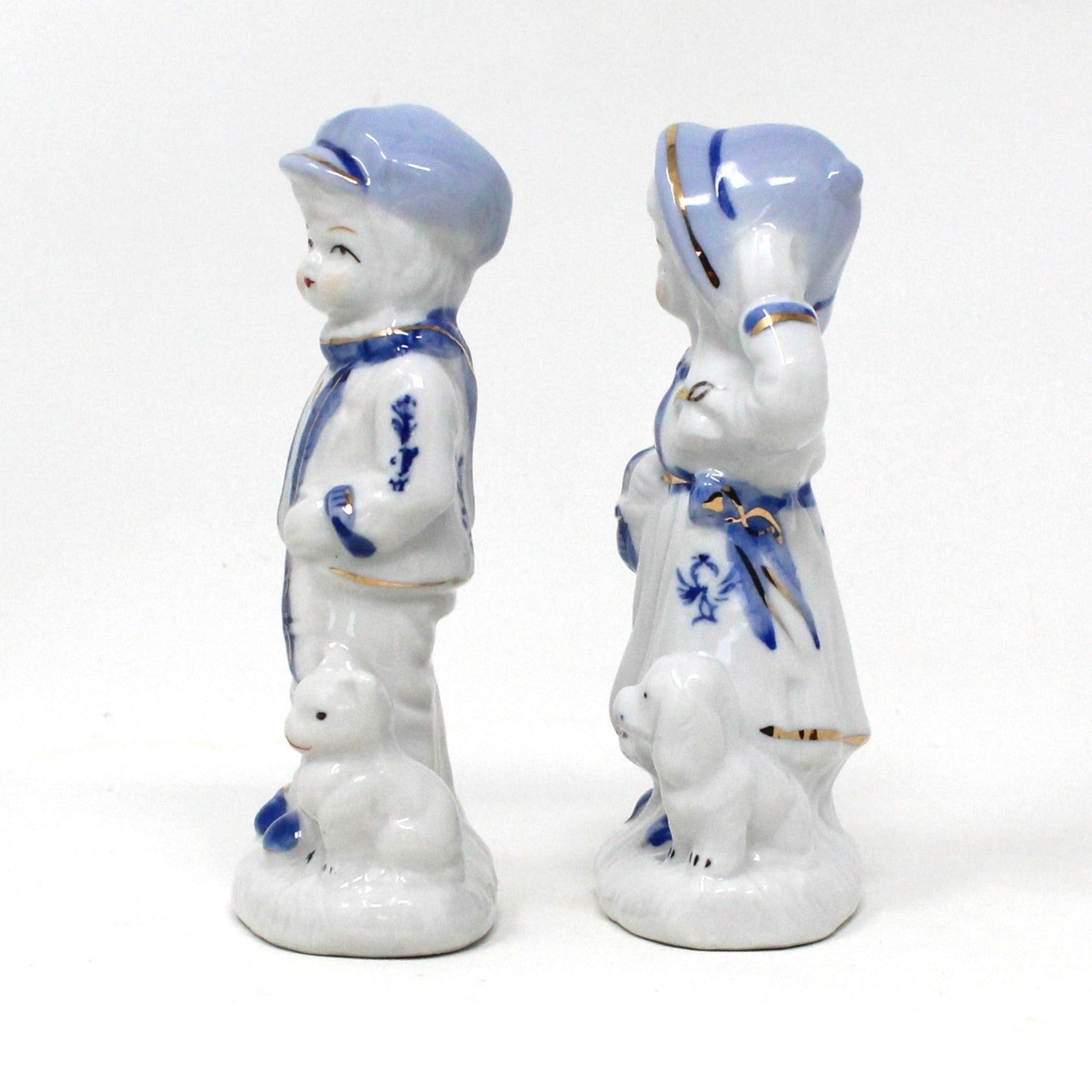 Blue and white chinaware figurine of a on sale boy throwing a ball