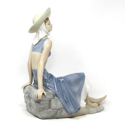 Sculpture, Nao / Lladro, Lady in Sunhat Sitting on Rock Wall, Retired NAO Figurine, Vintage