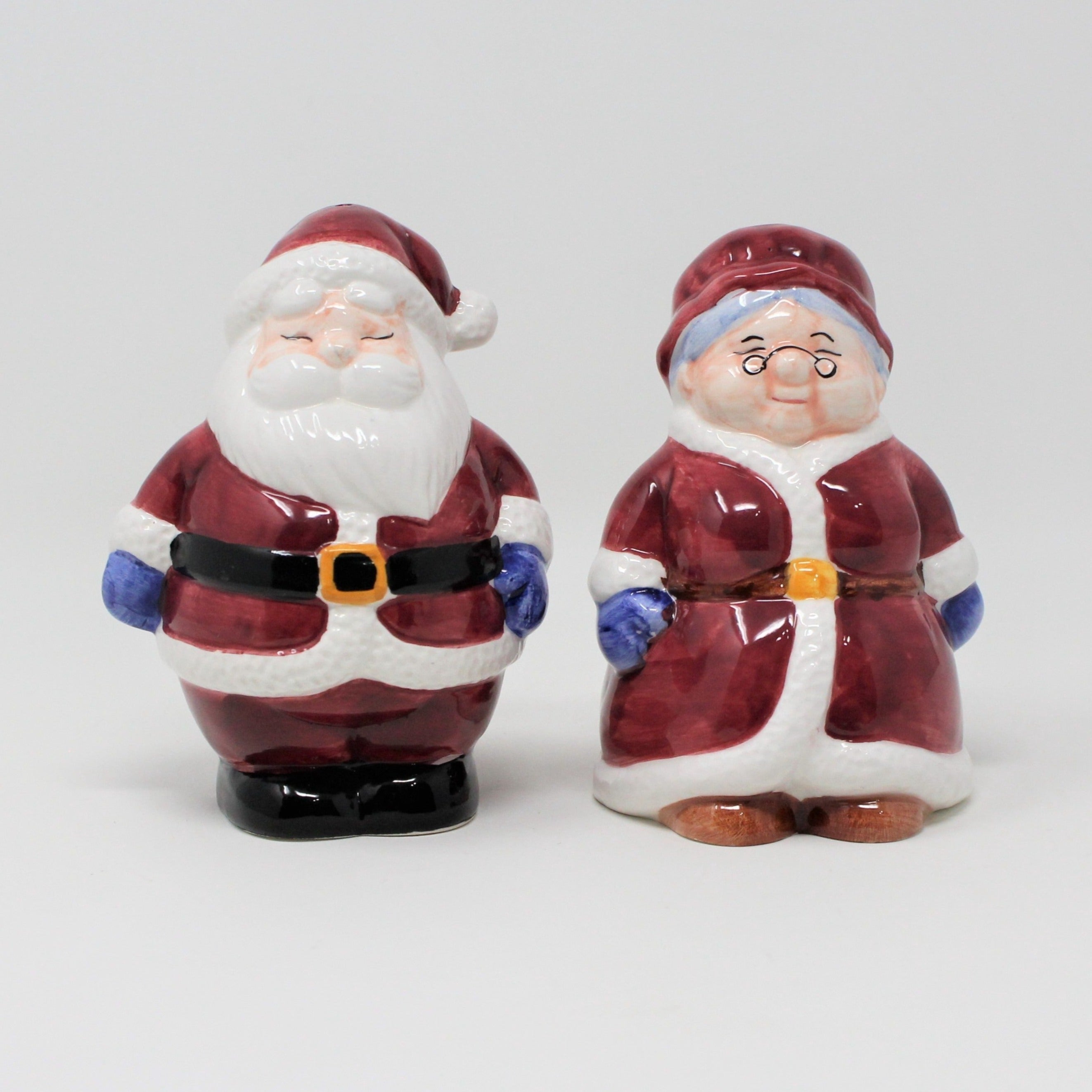 Vintage deals cowboy Santa and Mrs Claus salt pepper